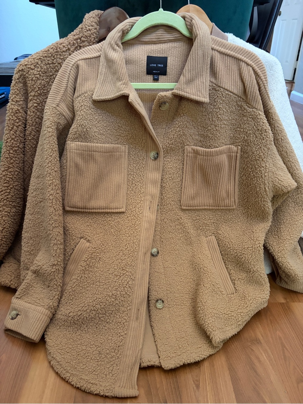All 3 Teddy style jackets in camel color.